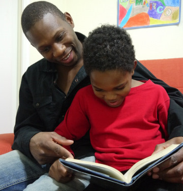 Father and son read